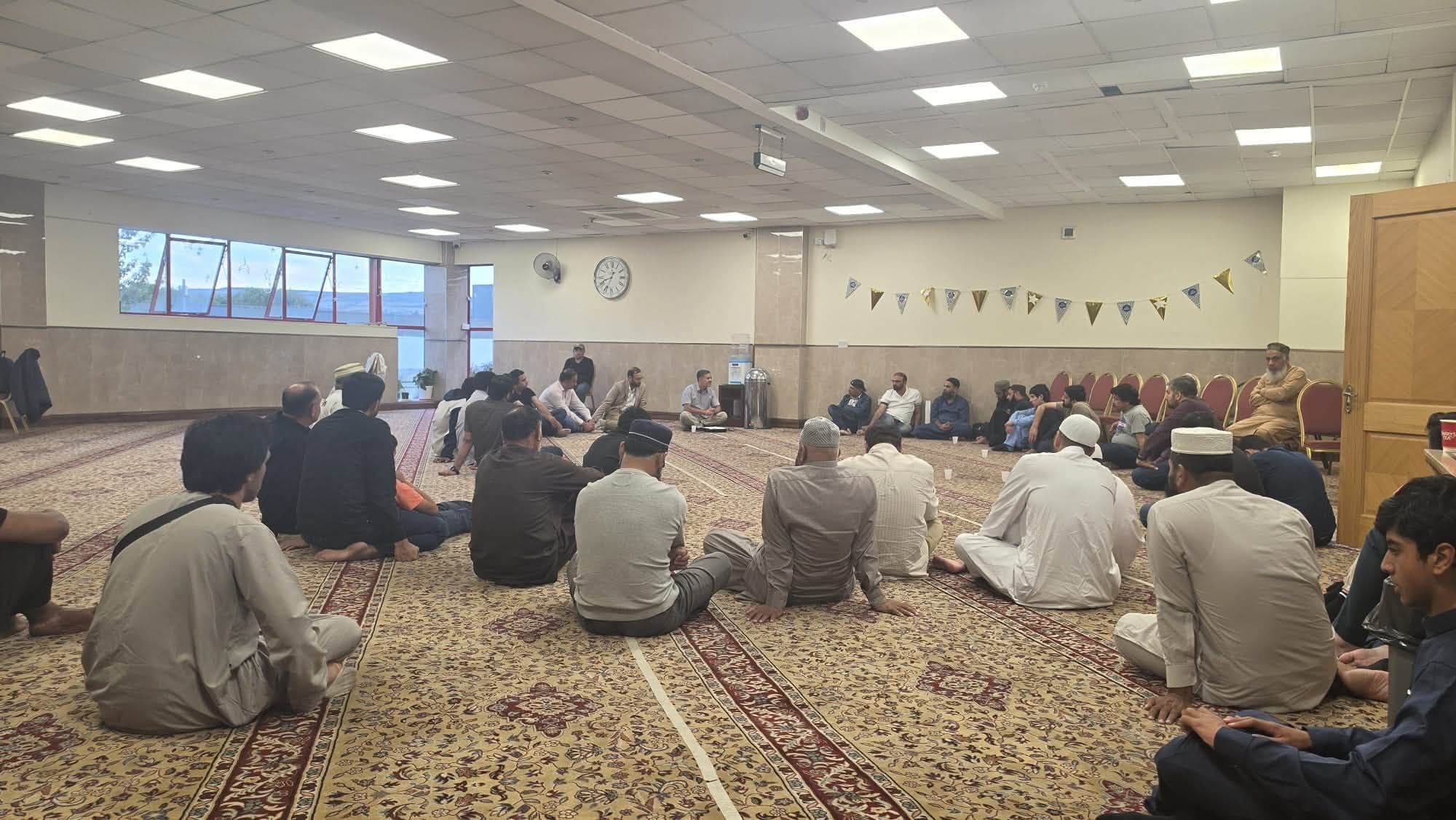 Attendees seated in a circle at the Muslim Families in Europe session